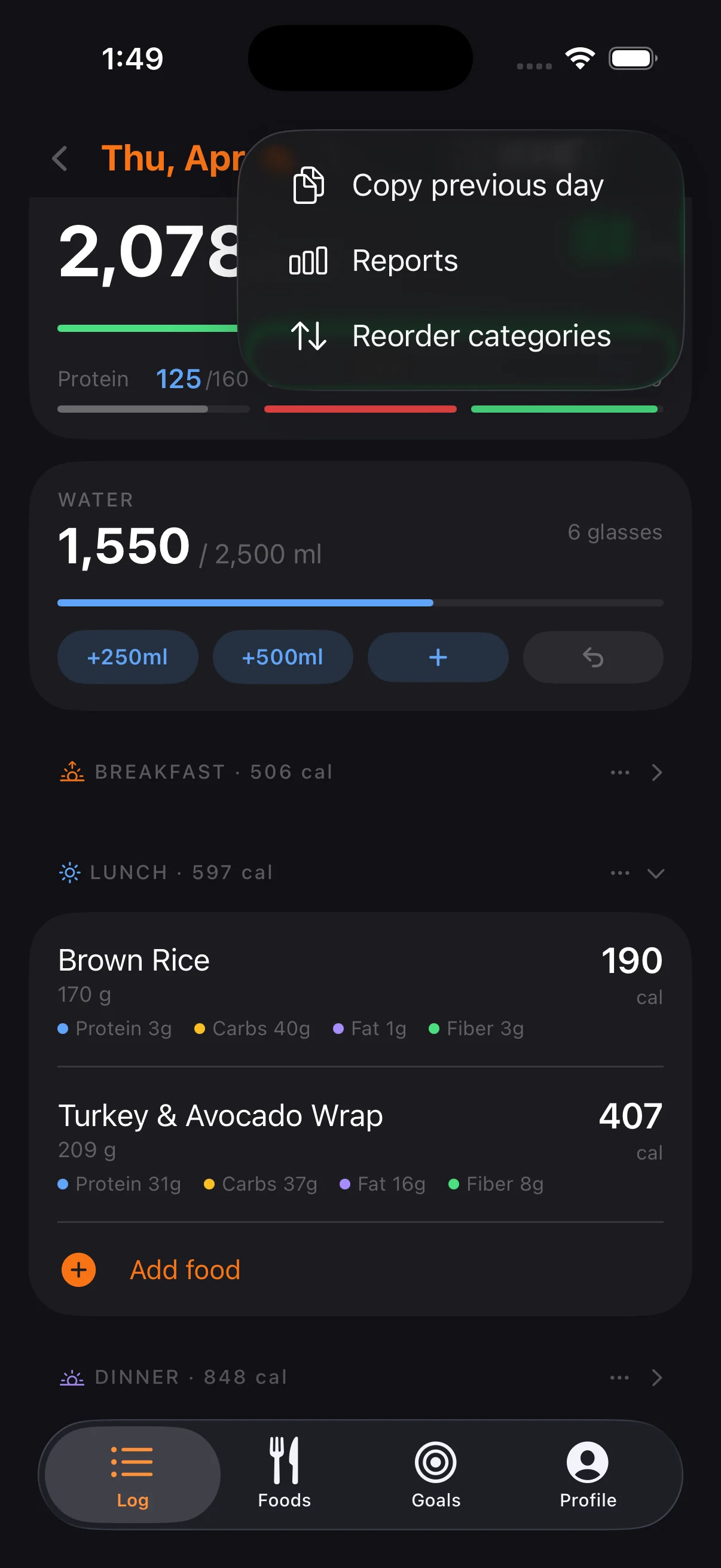 Copy the previous day's log, jump to Reports, or reorder meal categories from the ellipsis menu.
